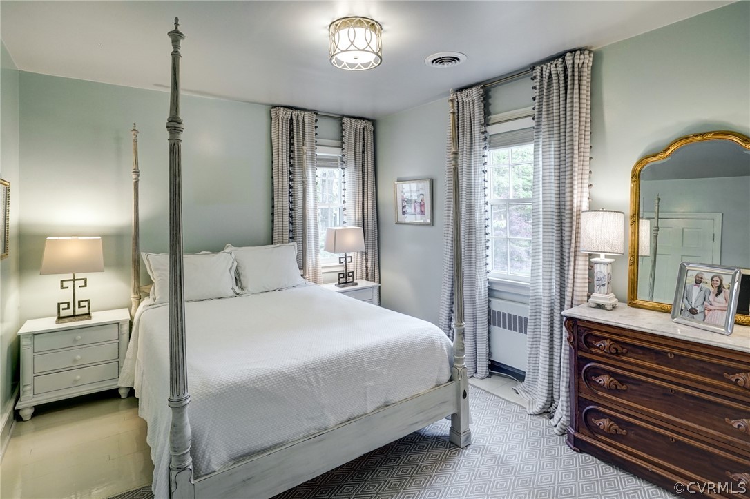 115 South Wilton Road Richmond, VA 23226 - Photo 25 of 33 a bedroom with a bed and a chandelier