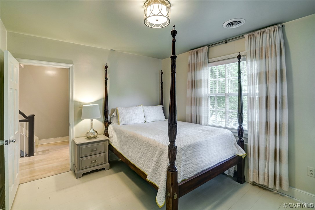 115 South Wilton Road Richmond, VA 23226 - Photo 26 of 33 a bedroom with a bed and a mirror