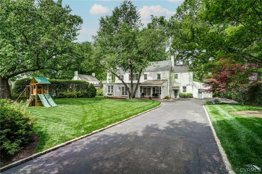 115 South Wilton Road Richmond, VA 23226 - Photo 6 of 33 a front view of a house with a yard and potted plants
