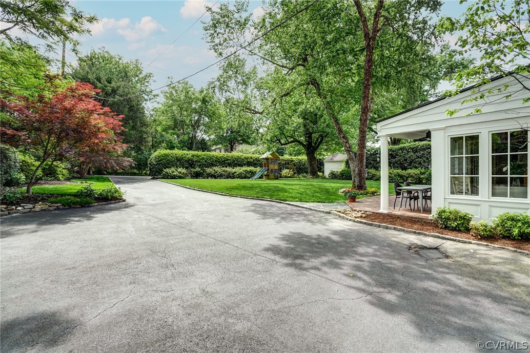 115 South Wilton Road Richmond, VA 23226 - Photo 8 of 33 a view of a house with a yard and potted plants