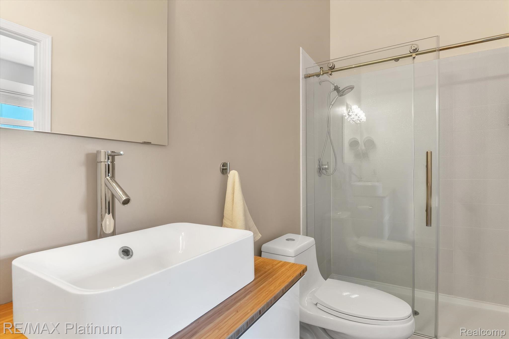 4961 Carrington Drive Rochester, MI 48306 - Photo 19 of 37 updated master bath! Beautiful frameless shower doors!