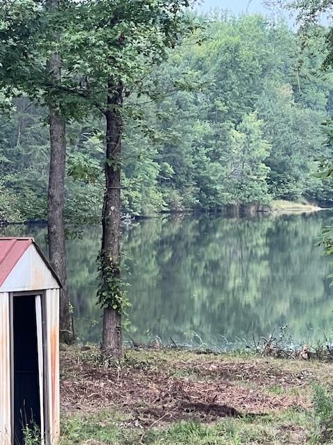 2014 Flat Rock Road York, SC 29745 - Photo 3 of 13 a view of a wooden house with a yard