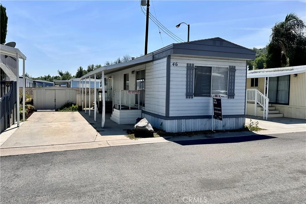 3825 Valley Walnut Ca Walnut, CA 91789 - Photo 2 of 27 a front view of a house with a garage