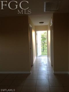 2135 Wilson Road Lehigh Acres, FL 33973 - Photo 16 of 17 a view of an empty room and window