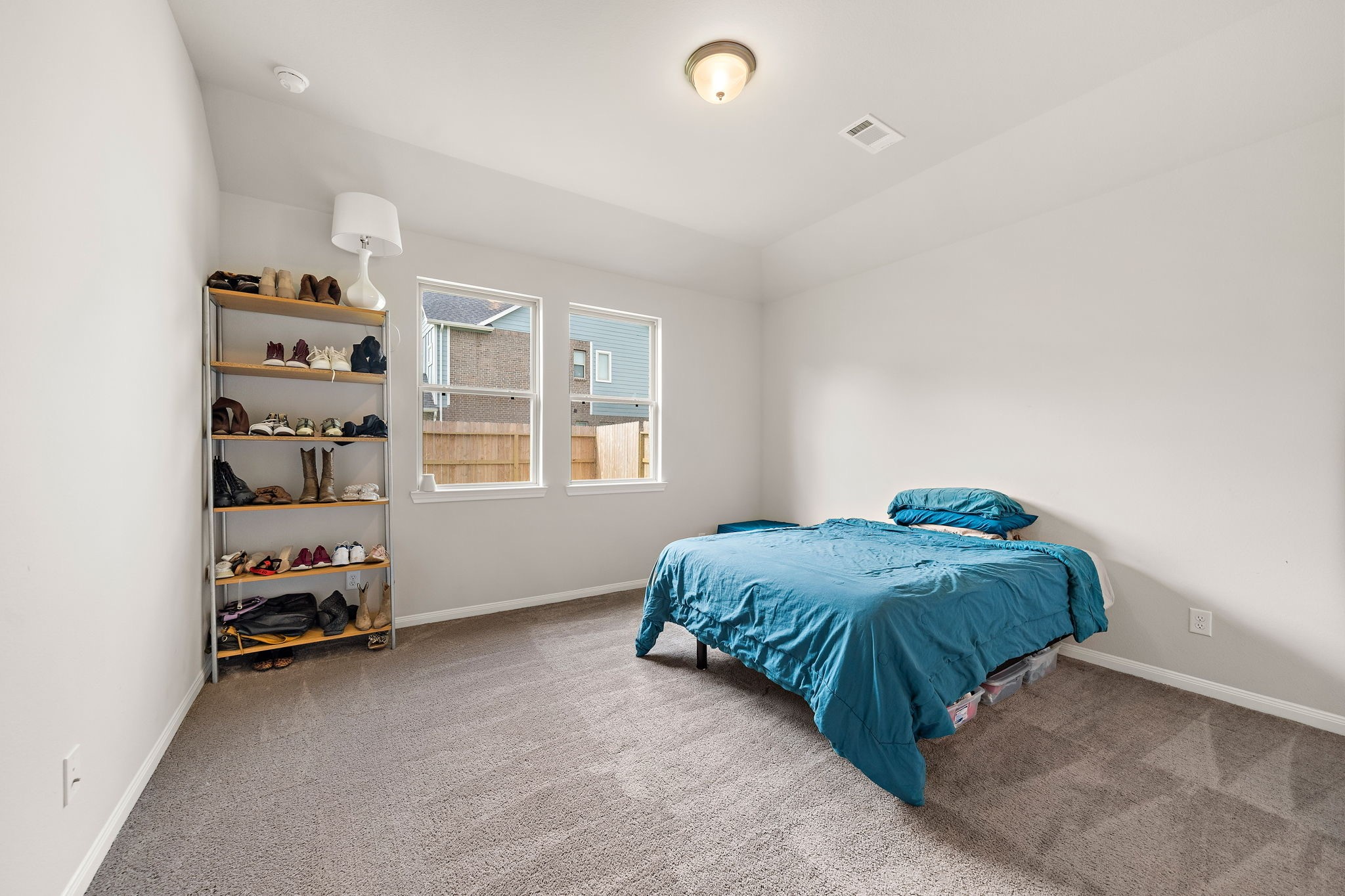 31203 Balsam Hawk Lane Hockley, TX 77447 - Photo 12 of 19 a en suite bathroom with a double vanity and a window