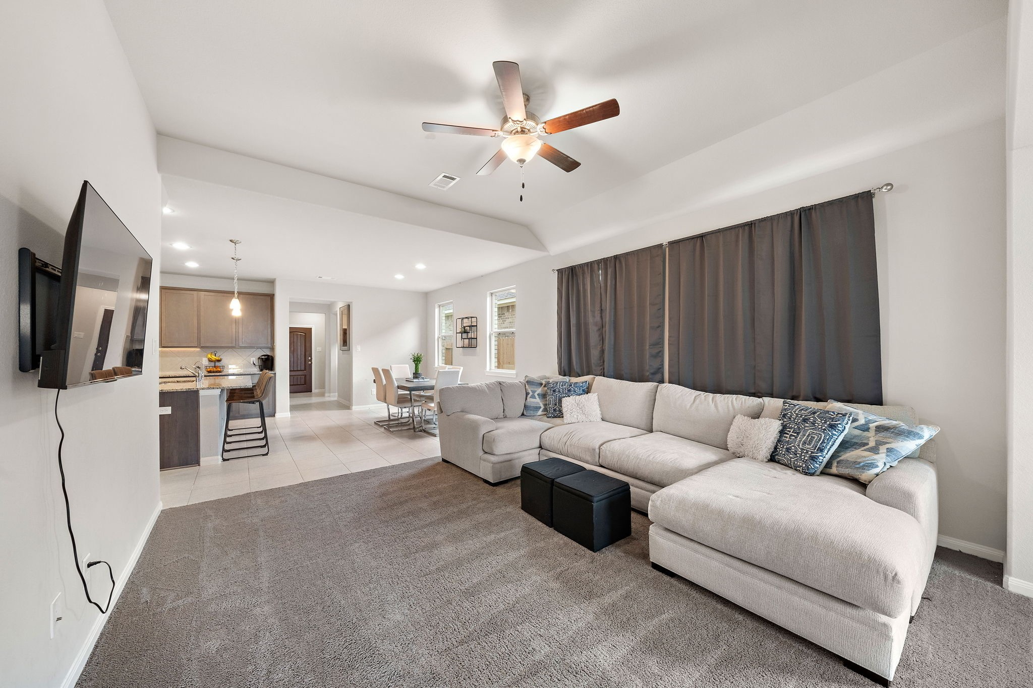 31203 Balsam Hawk Lane Hockley, TX 77447 - Photo 8 of 19 a living room with furniture and kitchen view