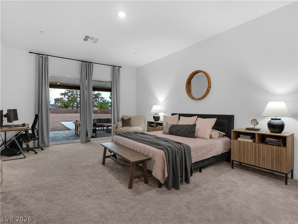 153 Montevallo Bnd Street Henderson, NV 89015 - Photo 26 of 65 Bedroom featuring light carpet, access to outside, an office area, and recessed lighting