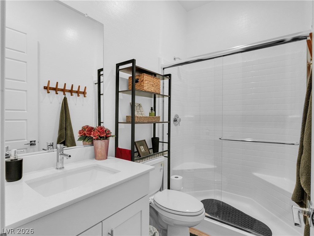 153 Montevallo Bnd Street Henderson, NV 89015 - Photo 48 of 65 Full bathroom with vanity and a stall shower