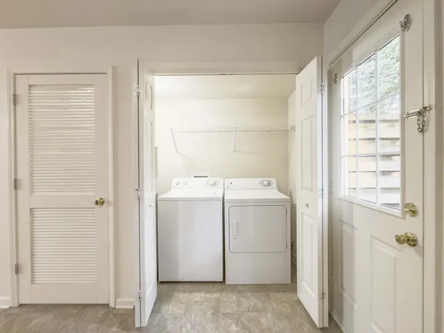 a utility room with dryer and washer
