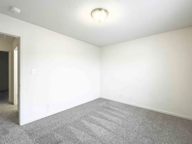 a view of a refrigerator in a room