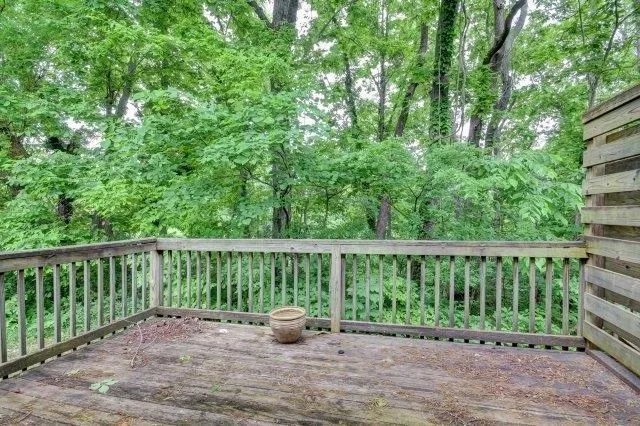 a balcony with outdoor view