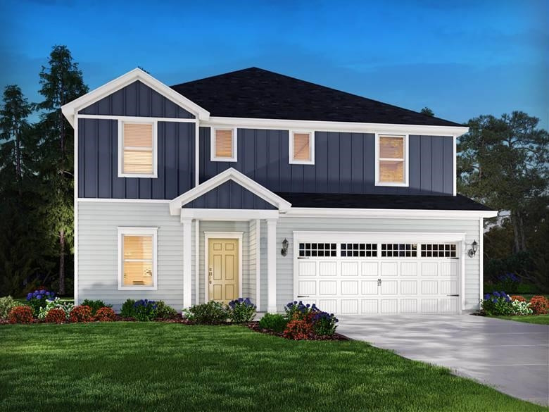 3945 Leeson Trail Raleigh, NC 27616 - Photo 1 of 5 a front view of a house with a yard
