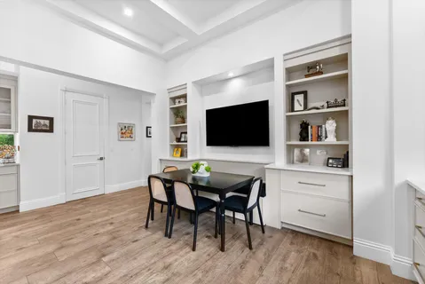 a bedroom with a large bed and a couch