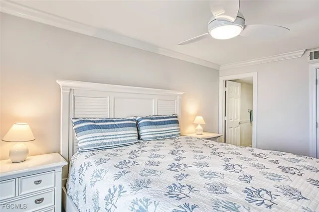 a bathroom with a double vanity sink toilet and shower