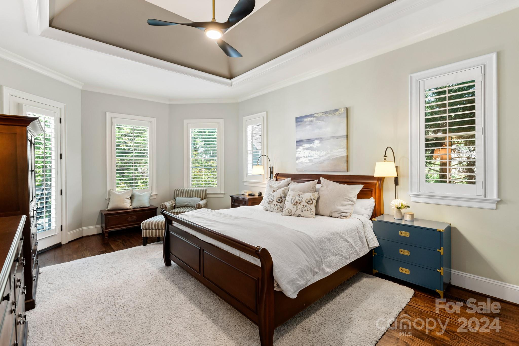 238 Horton Grove Road Fort Mill, SC 29715 - Photo 17 of 47 a spacious bedroom with a bed and a couch