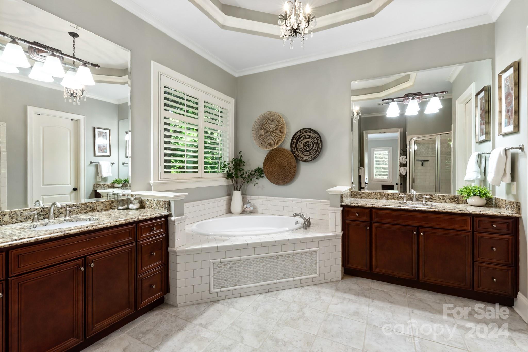 238 Horton Grove Road Fort Mill, SC 29715 - Photo 18 of 47 a spacious bathroom with a tub sink and mirror
