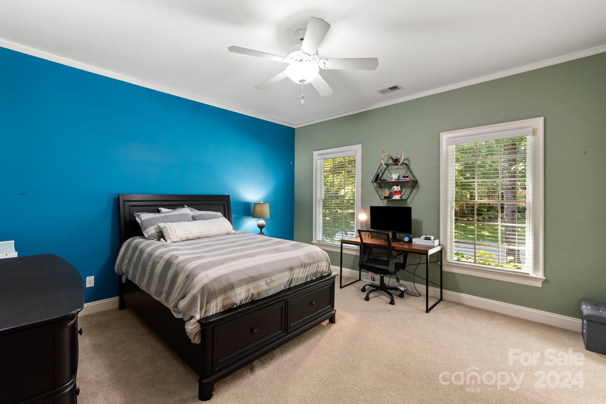 238 Horton Grove Road Fort Mill, SC 29715 - Photo 22 of 47 a bedroom with a bed table chair and a window