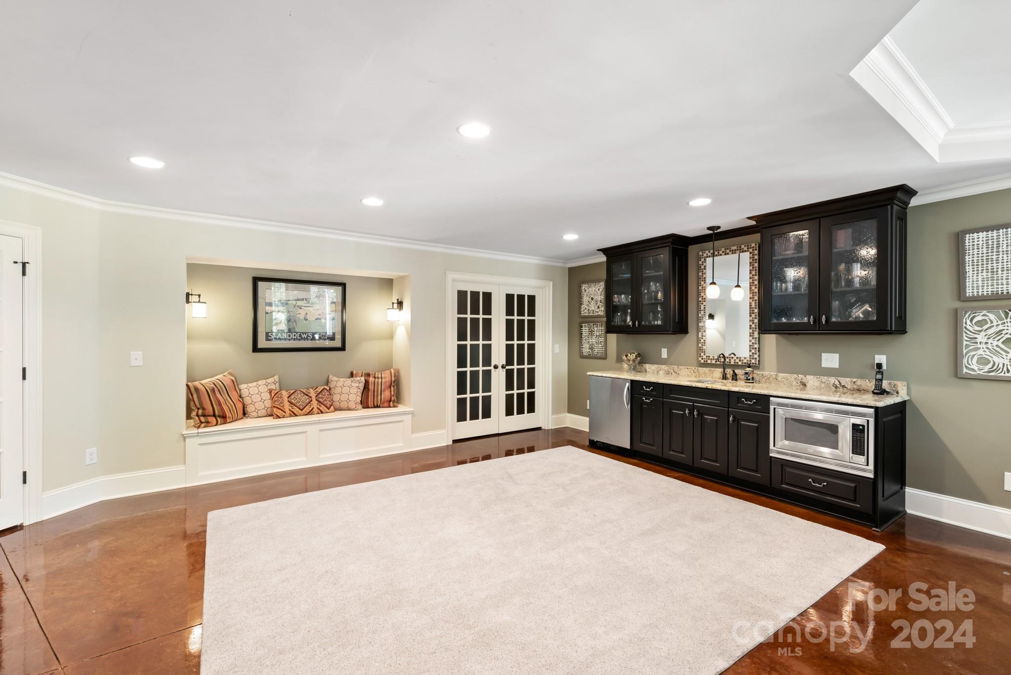 238 Horton Grove Road Fort Mill, SC 29715 - Photo 31 of 47 a large white kitchen with stainless steel appliances granite countertop a stove and a sink