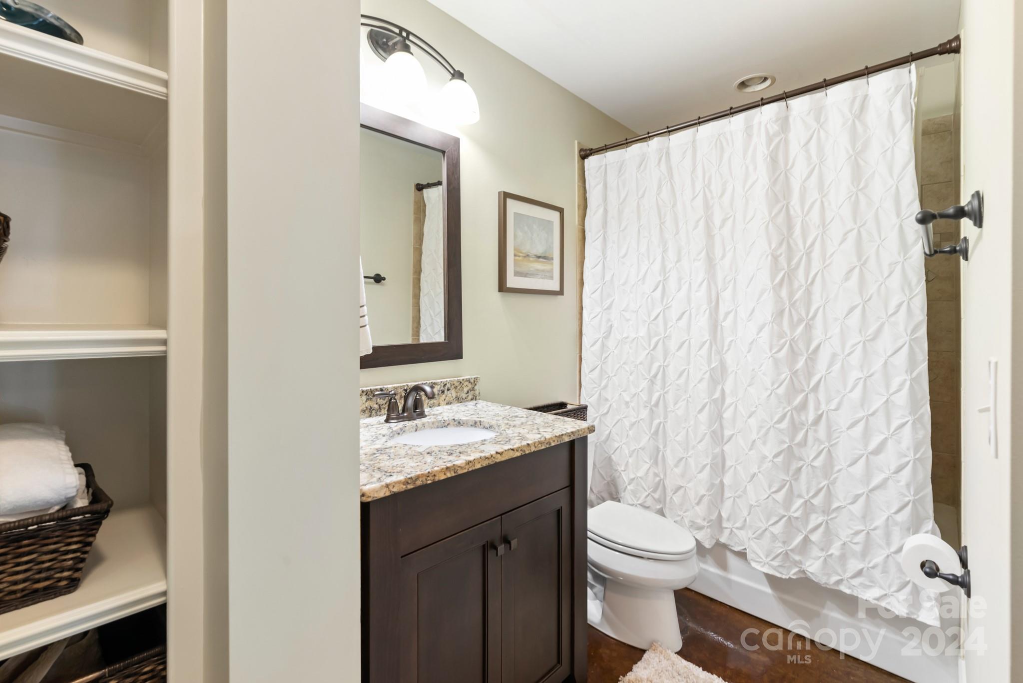 238 Horton Grove Road Fort Mill, SC 29715 - Photo 34 of 47 a bathroom with a granite countertop sink toilet and shower