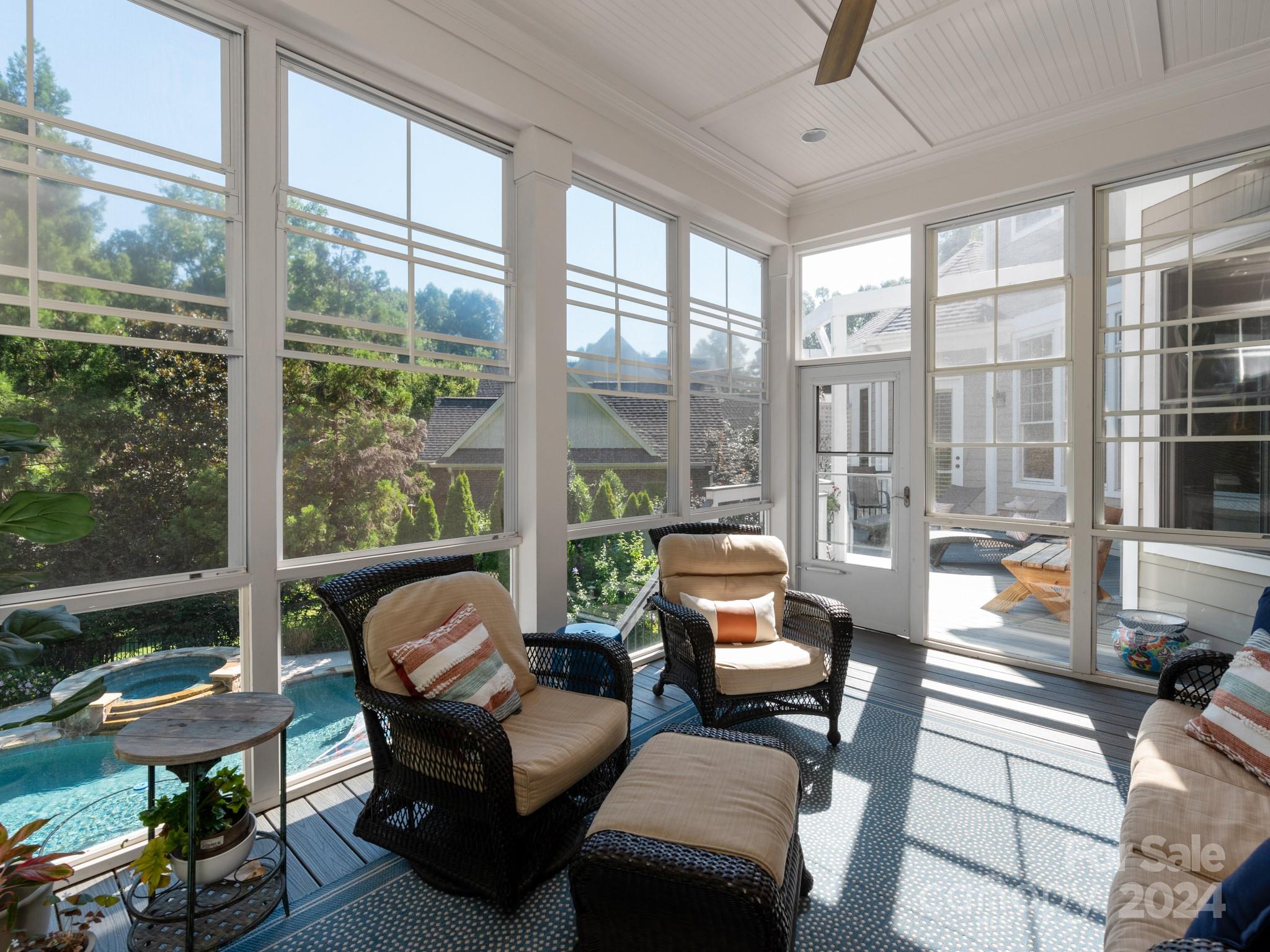 238 Horton Grove Road Fort Mill, SC 29715 - Photo 40 of 47 a living room with furniture and a floor to ceiling window