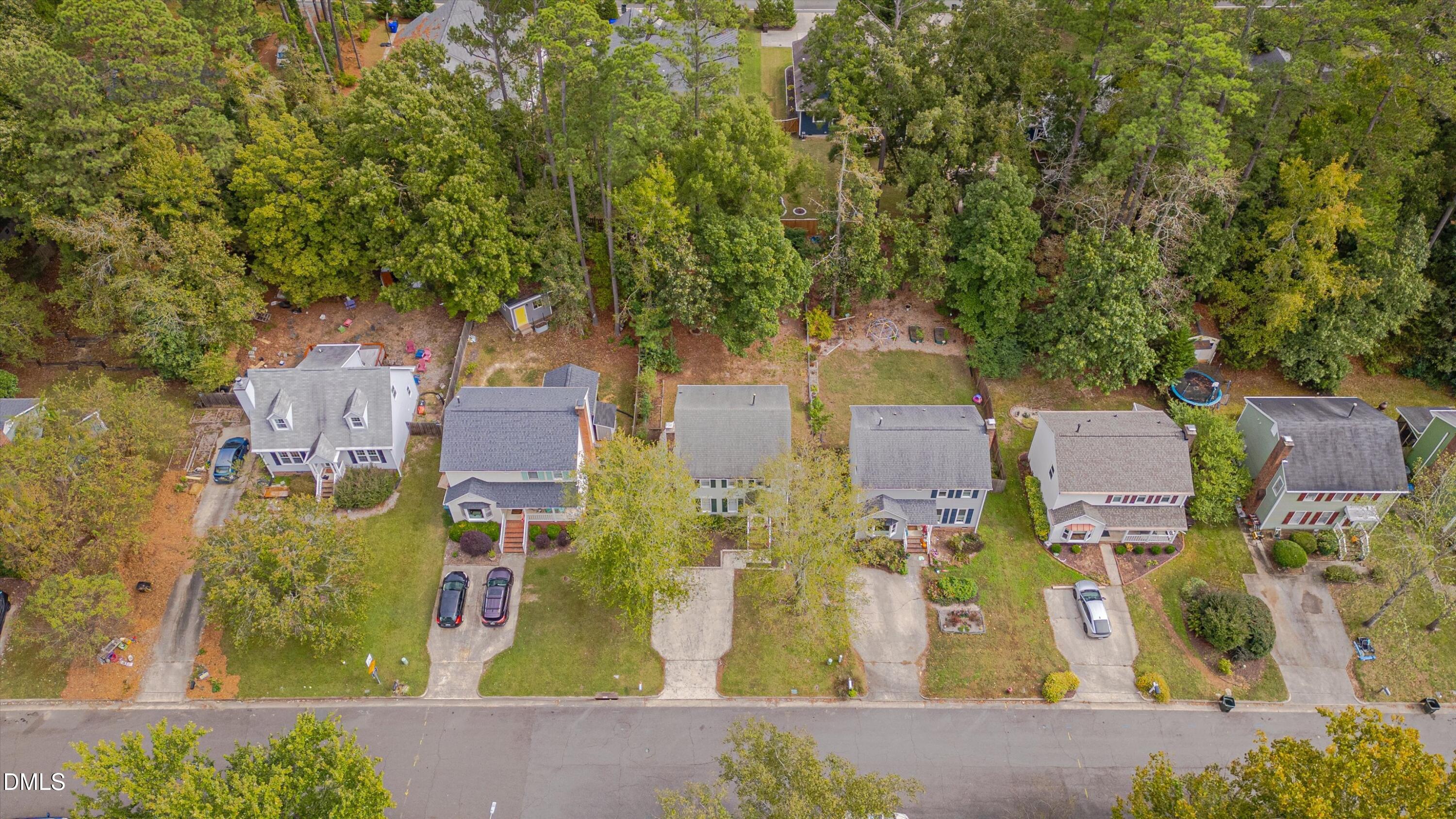 3301 Lassiter Street Durham, NC 27707 - Photo 30 of 32 an aerial view of residential houses with outdoor space