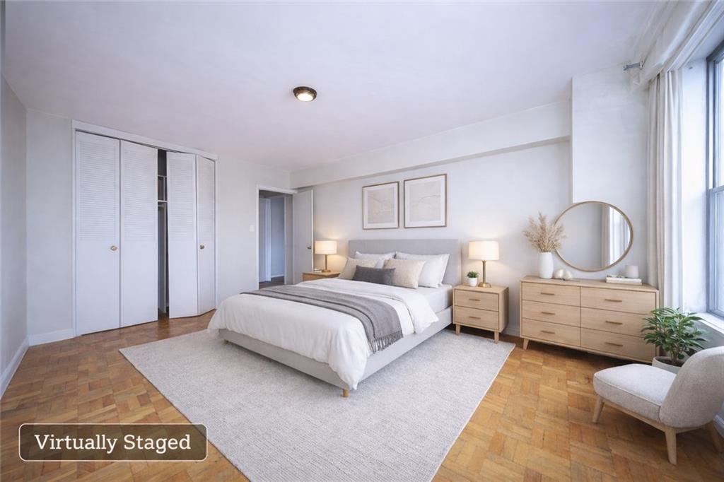 8901 Shore Road, Unit 7B Brooklyn, NY 11209 - Photo 7 of 12 a bedroom with a bed and window