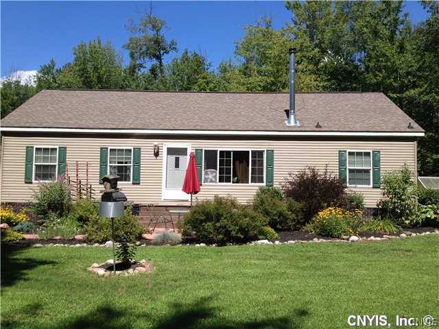 144 County Rte 17 Constantia, NY 13028 - Photo 1 of 1 Exterior Front Home is positioned facing the woods
