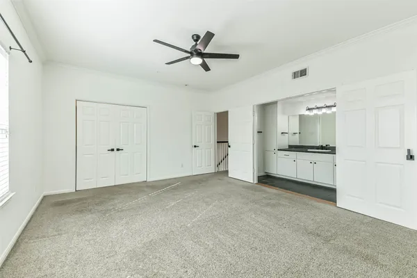 a view of a livingroom with a kitchen space a sink and dishwasher