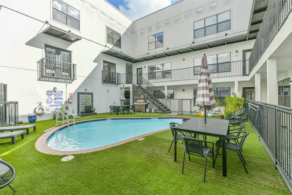 a view of a house with swimming pool