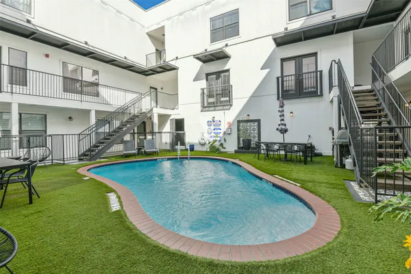 a view of a house with swimming pool