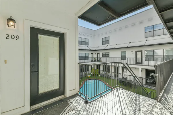 a view of staircase with white walls