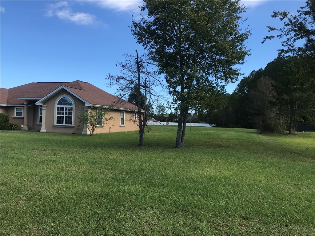 128 Avondale Road Brunswick, GA 31523 - Photo 11 of 12 FRONT YARD | SIDE YARD | BACK YARD | HUGE LOT