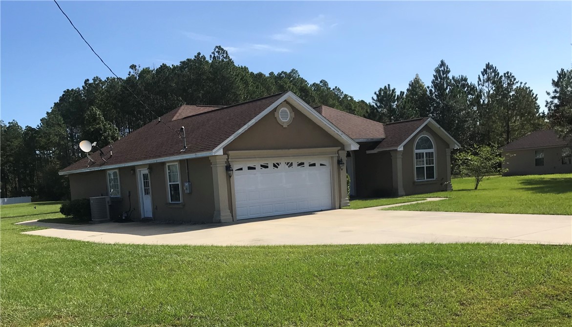 128 Avondale Road Brunswick, GA 31523 - Photo 2 of 12 HOME SIDE VIEW