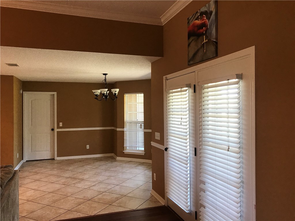 128 Avondale Road Brunswick, GA 31523 - Photo 12 of 12 OPEN FLOOR PLAN TO KTICHEN FRENCH DOORS TO BACK PORCH & PATIO OFF LIVING ROOM
