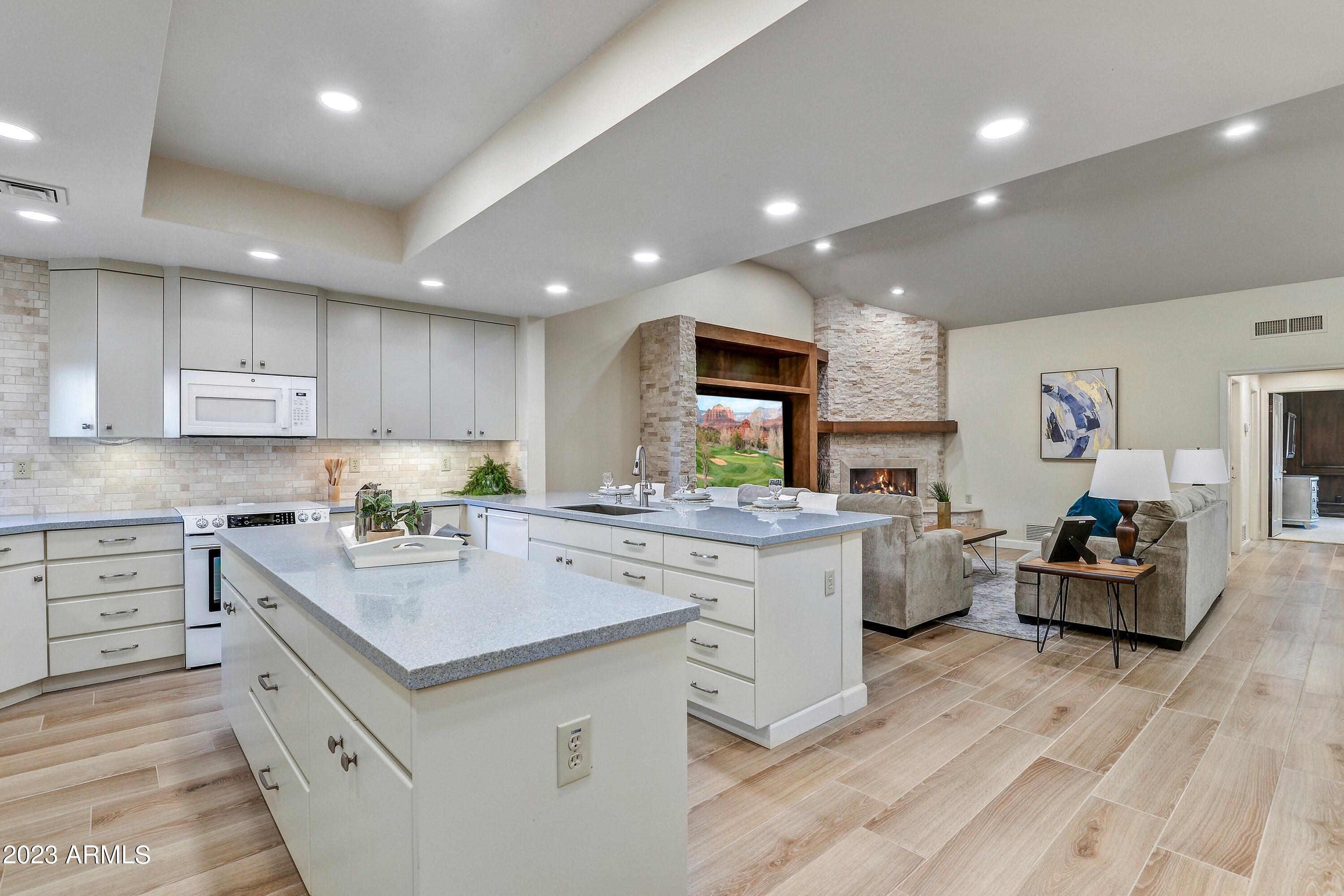 4436 East Camelback Road, Unit 36 Phoenix, AZ 85018 - Photo 11 of 34 012_Open KitchenFamily