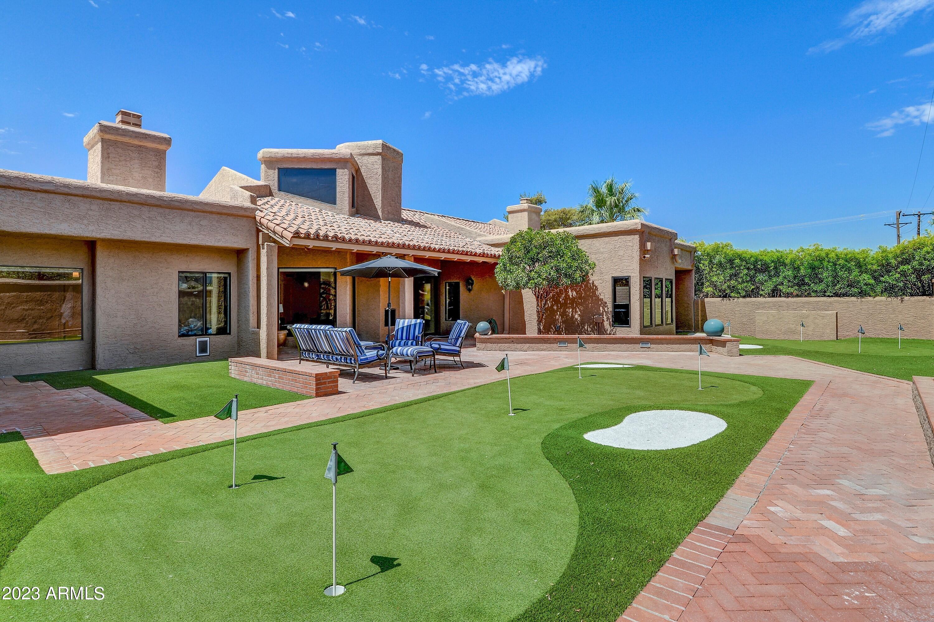 4436 East Camelback Road, Unit 36 Phoenix, AZ 85018 - Photo 25 of 34 026_Low Maintenance Rear Yard