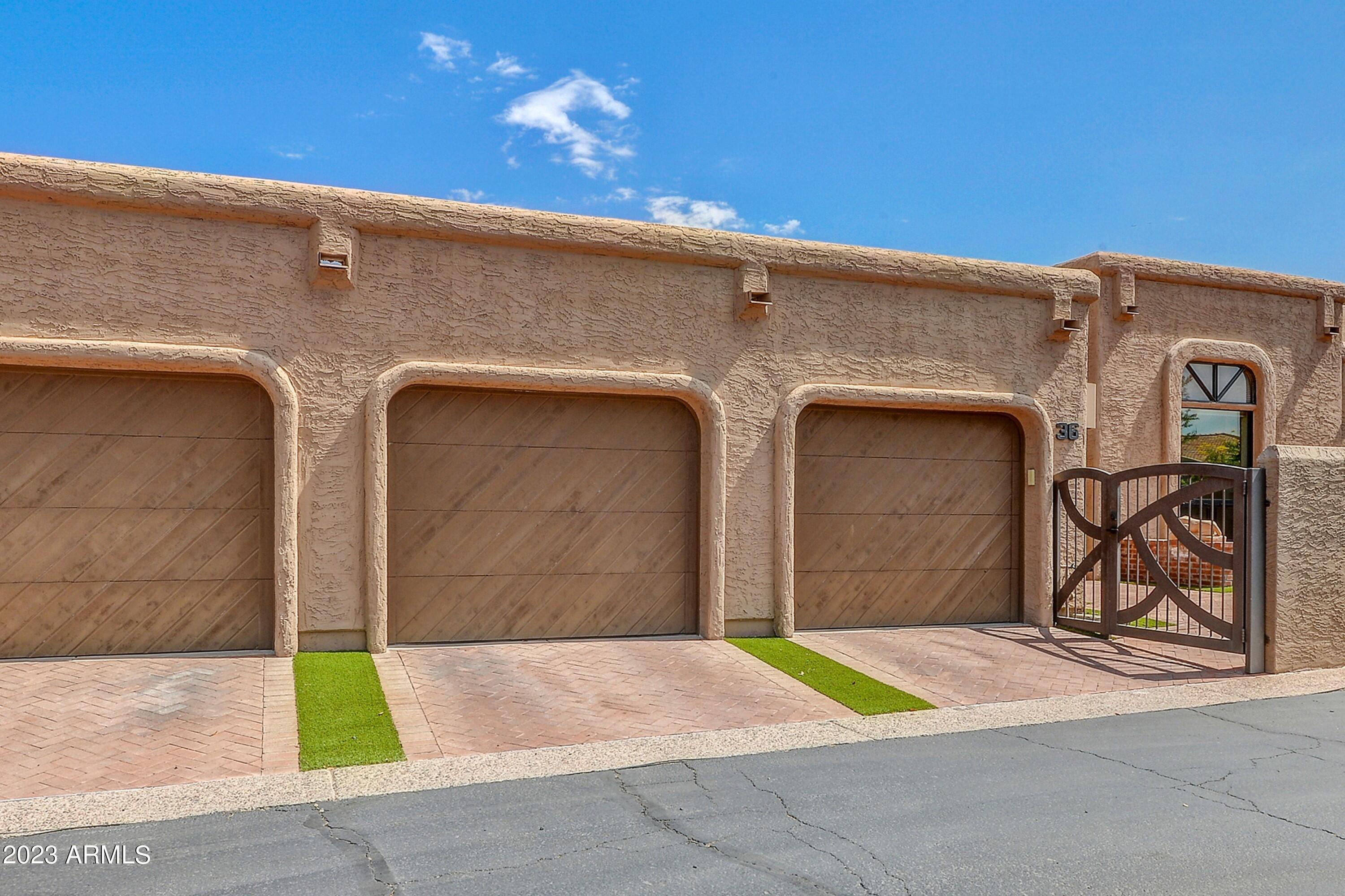 4436 East Camelback Road, Unit 36 Phoenix, AZ 85018 - Photo 34 of 34 034_Panoramic of 3 Car Garages