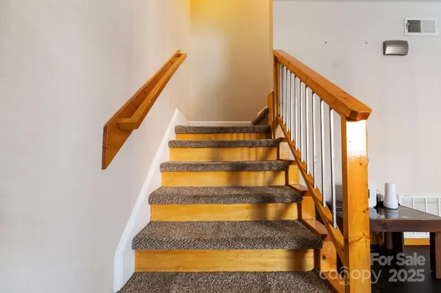 a view of an entryway with staircase