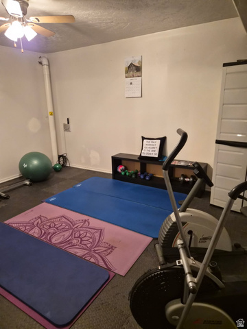 1697 West 2450 Vernal, UT 84078 - Photo 16 of 36 Exercise area with a ceiling fan and baseboards