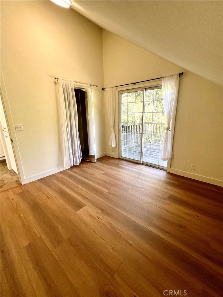 1530 Emerson Road Cambria, CA 93428 - Photo 34 of 54 Upstairs bedroom with glass door to private deck overlooking back yard