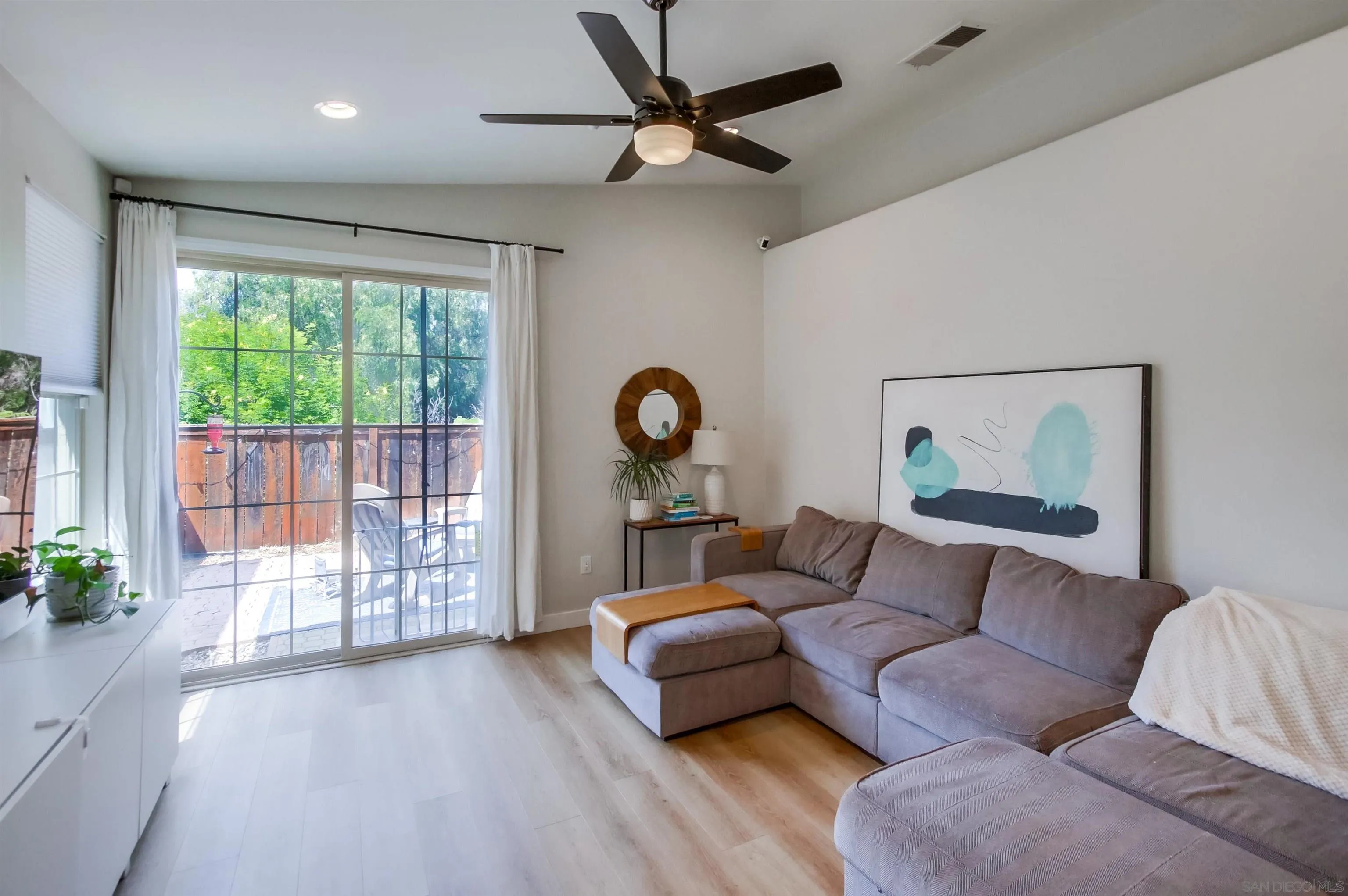 8535 Elliot Lane Santee, CA 92071 - Photo 13 of 43 a living room with furniture and a large window