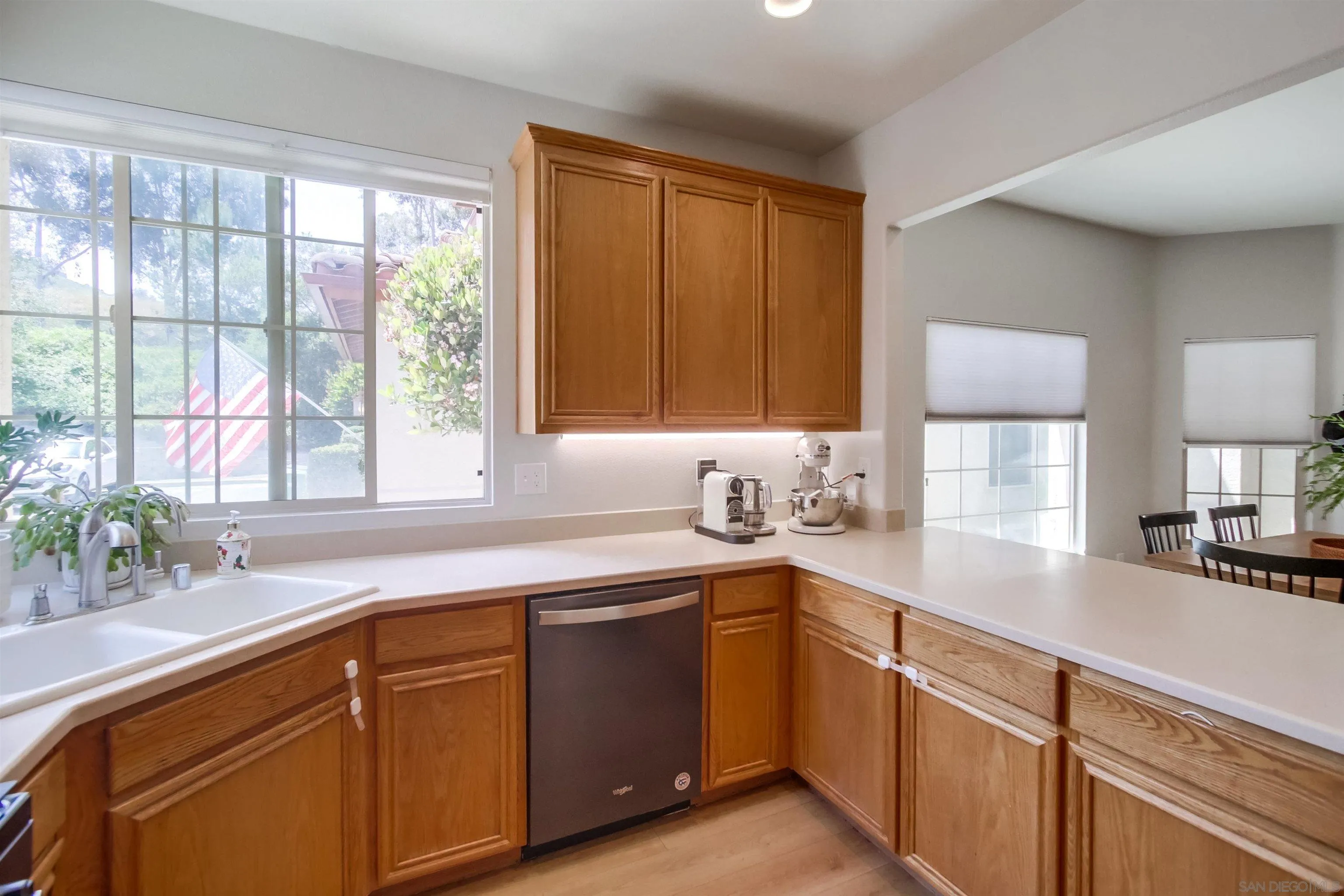 8535 Elliot Lane Santee, CA 92071 - Photo 17 of 43 a kitchen with a sink and a window
