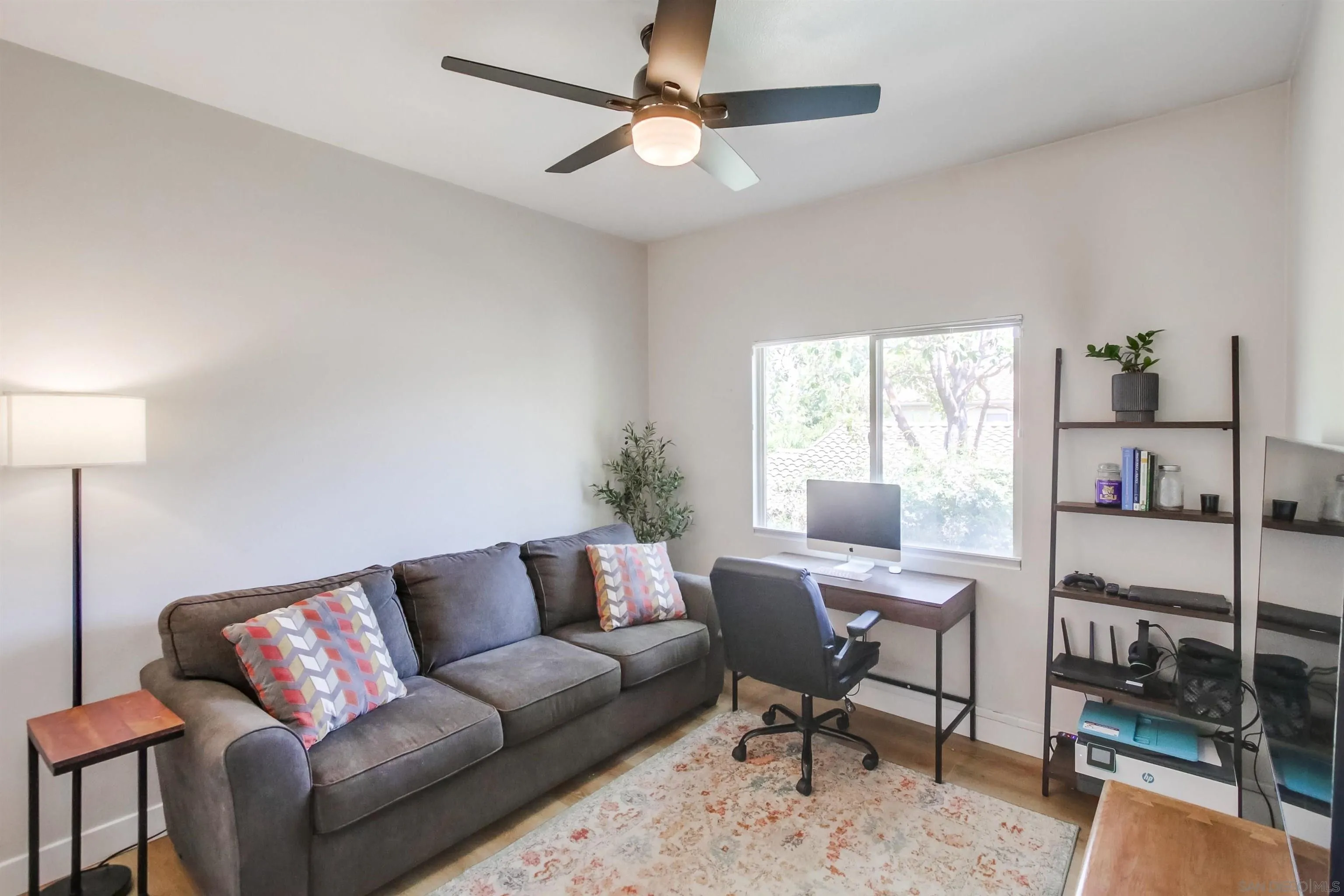 8535 Elliot Lane Santee, CA 92071 - Photo 24 of 43 a view of a livingroom with workspace and a couch