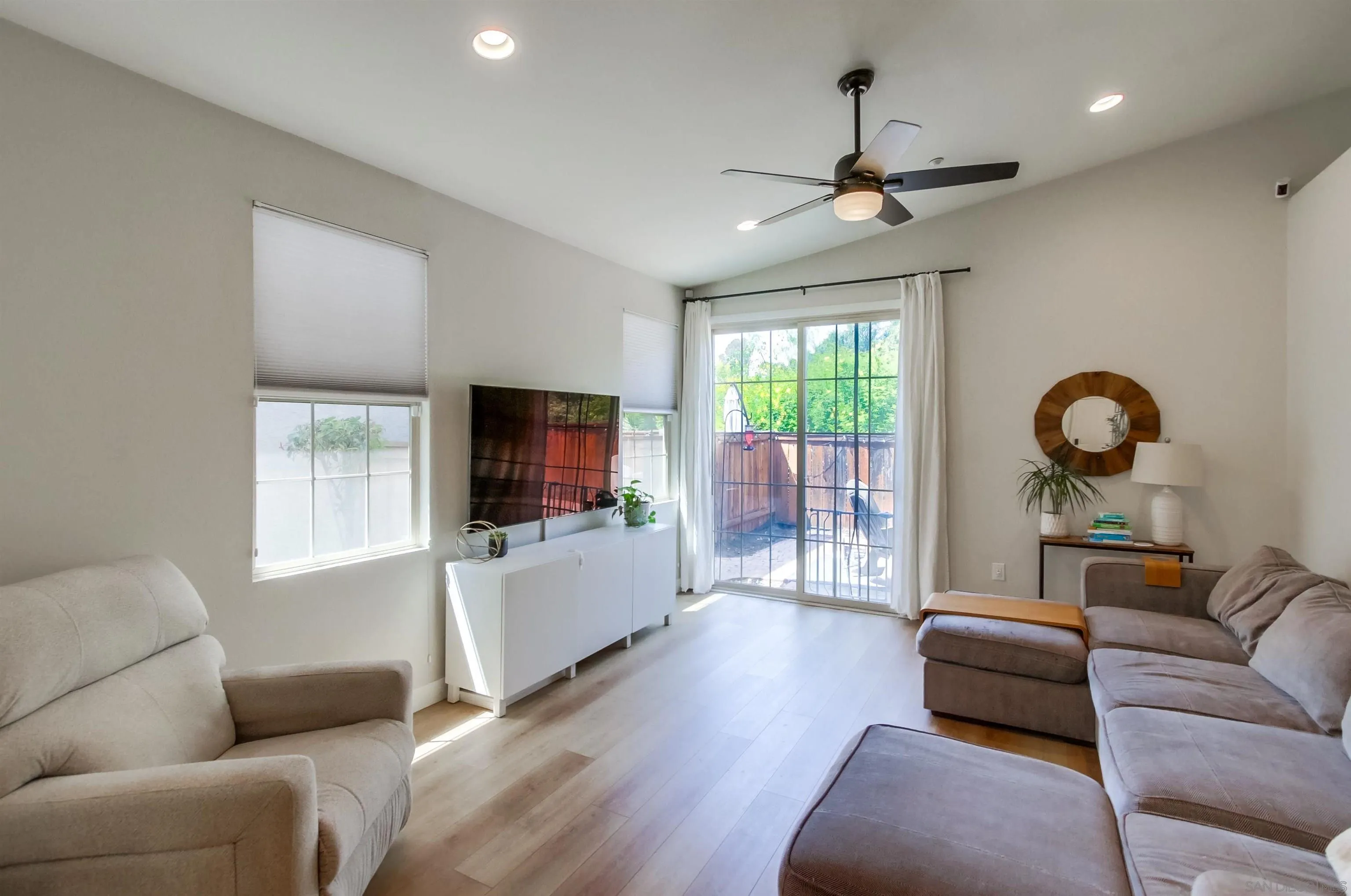 8535 Elliot Lane Santee, CA 92071 - Photo 3 of 43 a living room with furniture and a flat screen tv