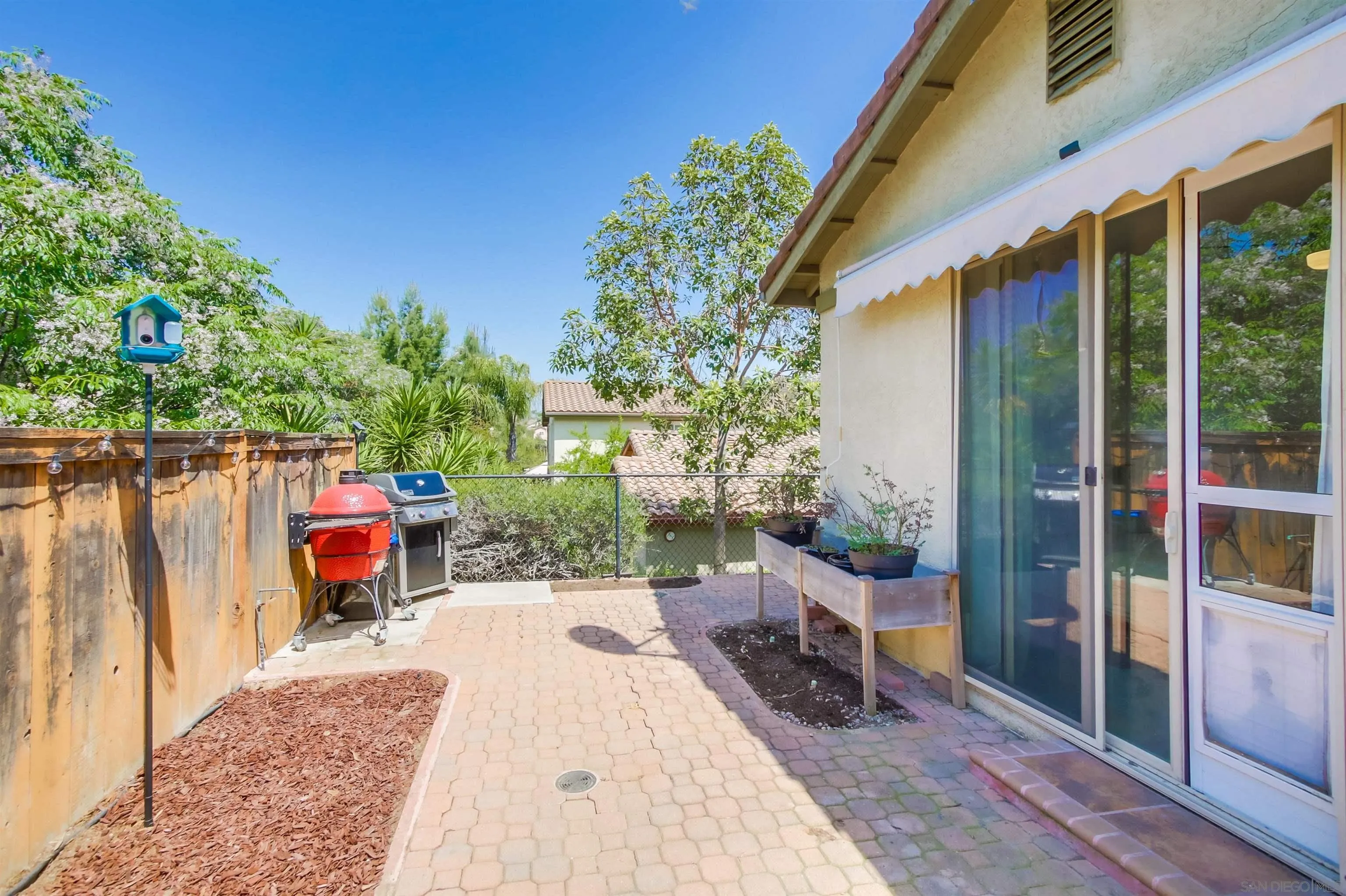 8535 Elliot Lane Santee, CA 92071 - Photo 34 of 43 a backyard of a house with seating space