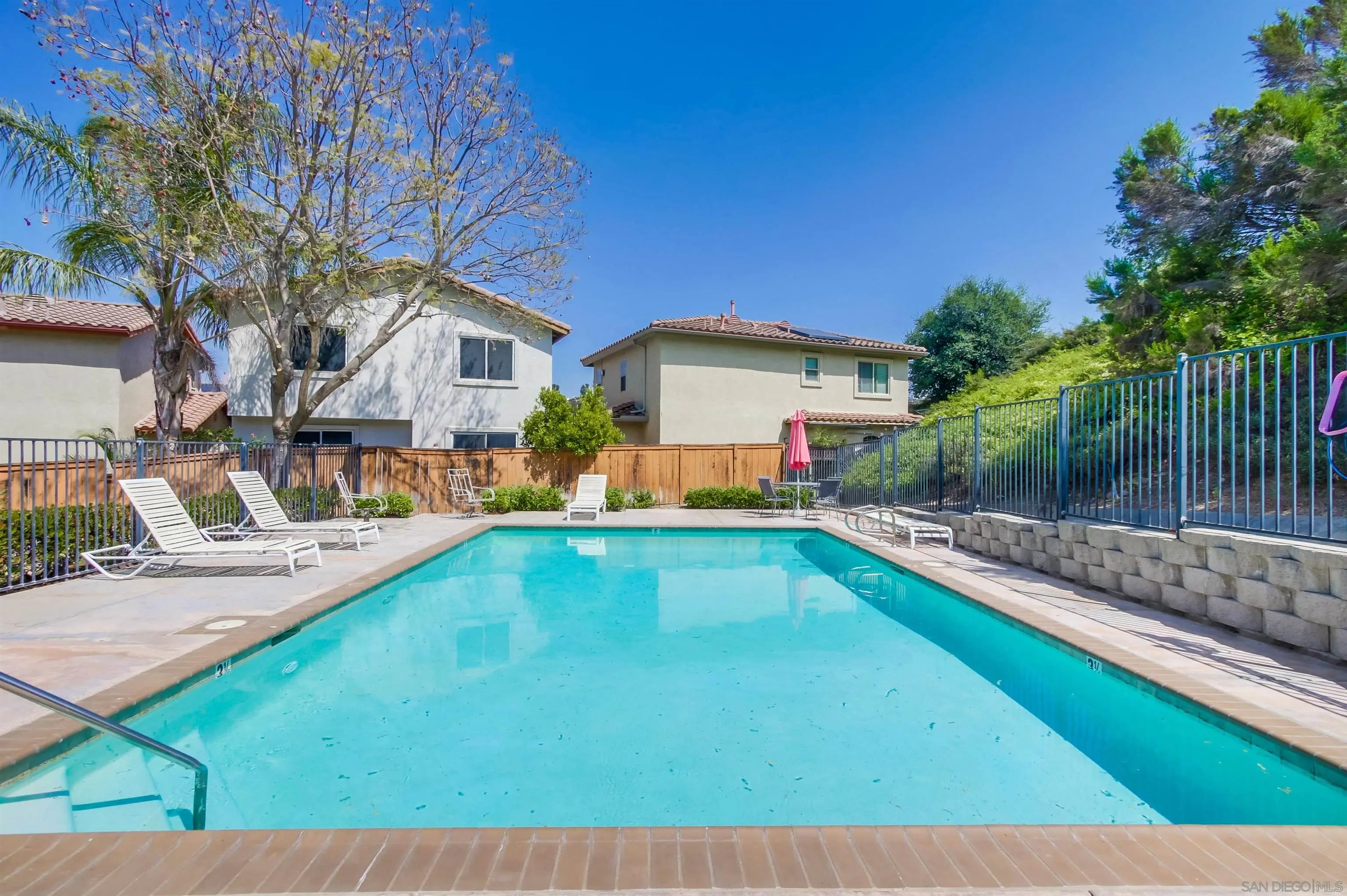 8535 Elliot Lane Santee, CA 92071 - Photo 39 of 43 a swimming pool view with a seating space and a garden view