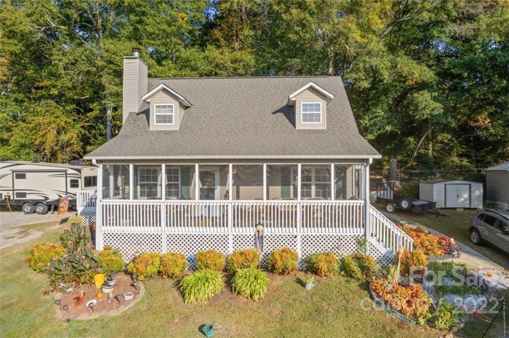 143 Mathis Dairy Road Spartanburg, SC 29307 - Photo 1 of 16 a view of a house with a yard