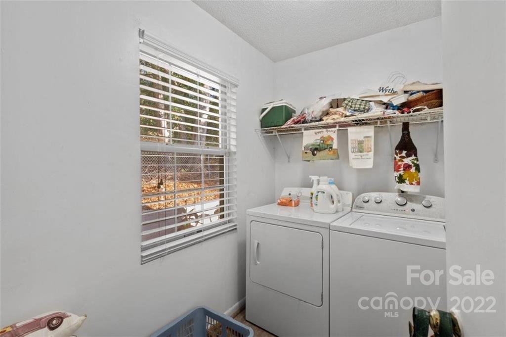 143 Mathis Dairy Road Spartanburg, SC 29307 - Photo 8 of 16 a utility room with dryer and washer