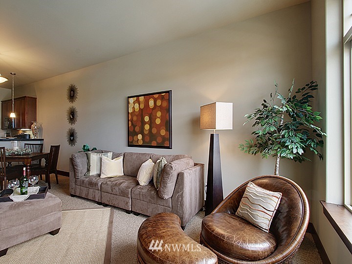 3910 Northeast 3rd Place Renton, WA 98056 - Photo 5 of 15 a living room with furniture and a potted plant