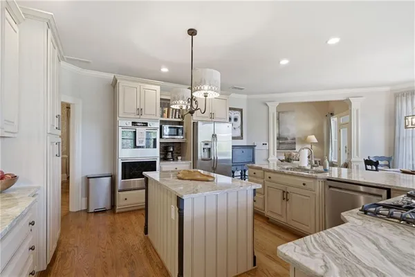 a dining room with furniture window wooden floor